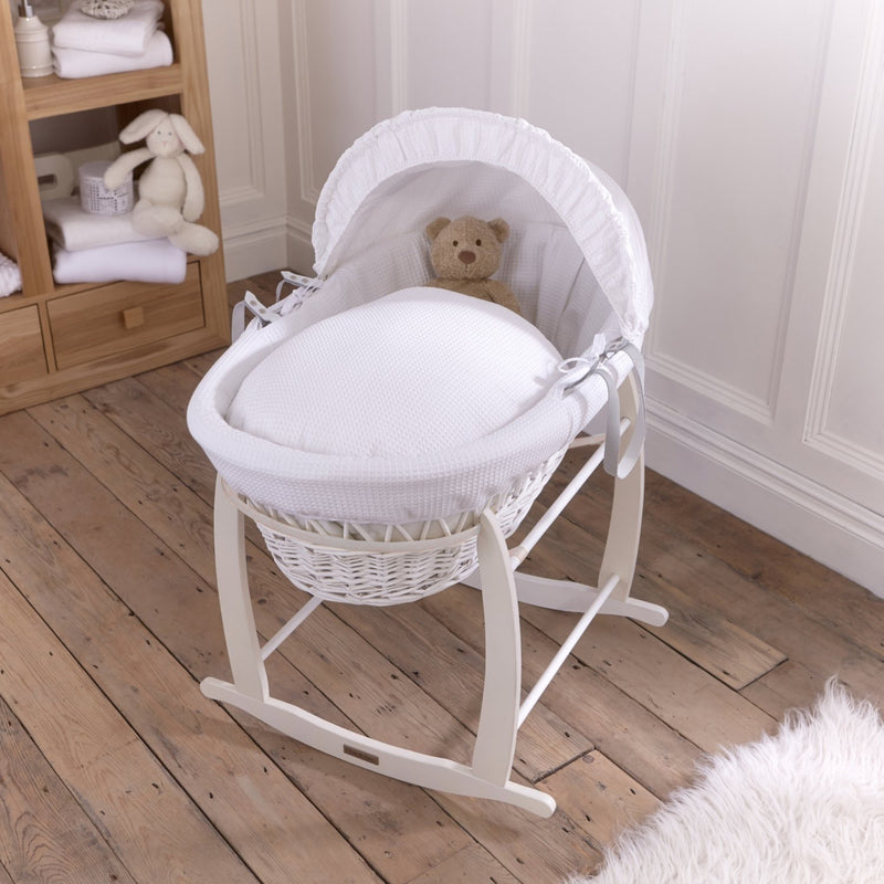 White Waffle White Wicker Moses Basket on the White Deluxe Rocking Stand in a minimalist bedroom | Co-sleepers | Nursery Furniture - Clair de Lune UK
