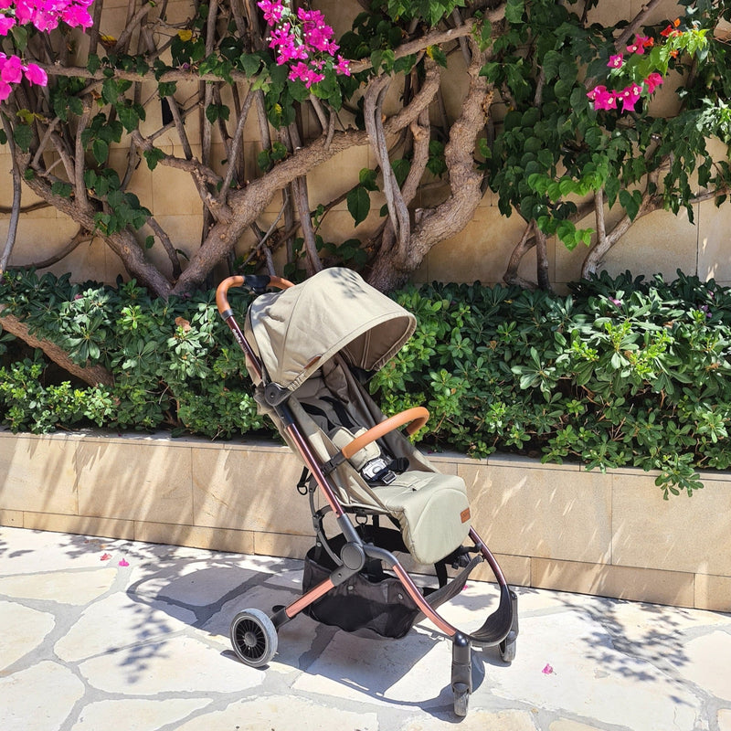 Didofy Green New Aster 2 Ultra-Compact Pushchair & Travel System in the sunlight | Didofy | Pushchairs and Travel Systems | Baby & Kid Travel - Clair de Lune UK
