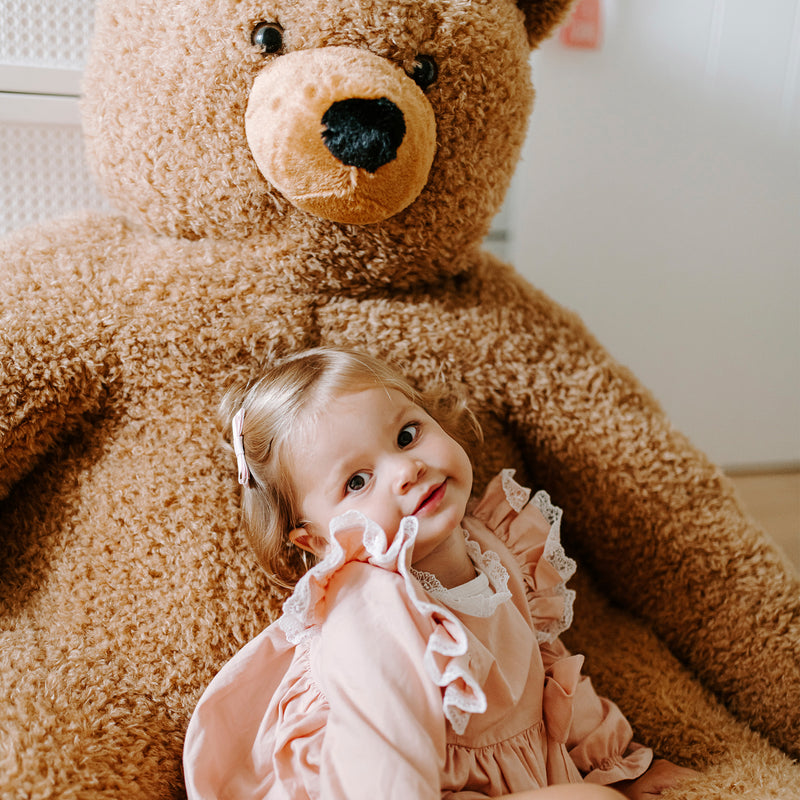 Little girl next to her best friend Childhome Sitting Teddy | Bear Toys | Baby Shower, Birthday & Christmas Gifts - Clair de Lune UK