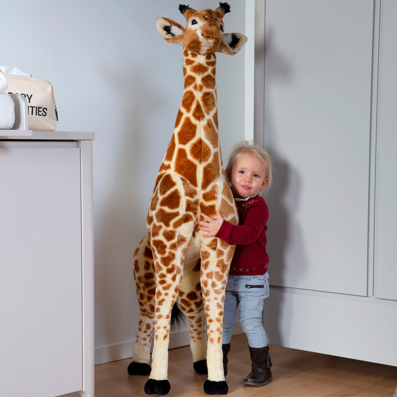 Toddler hugging her Childhome Standing Giraffe | Toys | Baby Shower, Birthday & Christmas Gifts - Clair de Lune UK