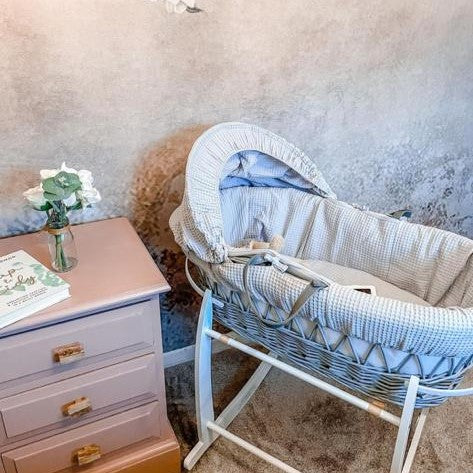 Grey Waffle Grey Wicker Moses Basket on the Grey Deluxe Rocking Stand in a grey minimalist nursery - UGC | Moses Baskets | Co-sleepers | Nursery Furniture - Clair de Lune UK