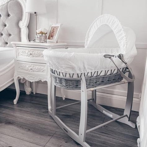 White Waffle Grey Wicker Moses Basket on the Grey Deluxe Rocking Stand in a classic vintage style bedroom | Co-sleepers | Nursery Furniture - Clair de Lune UK