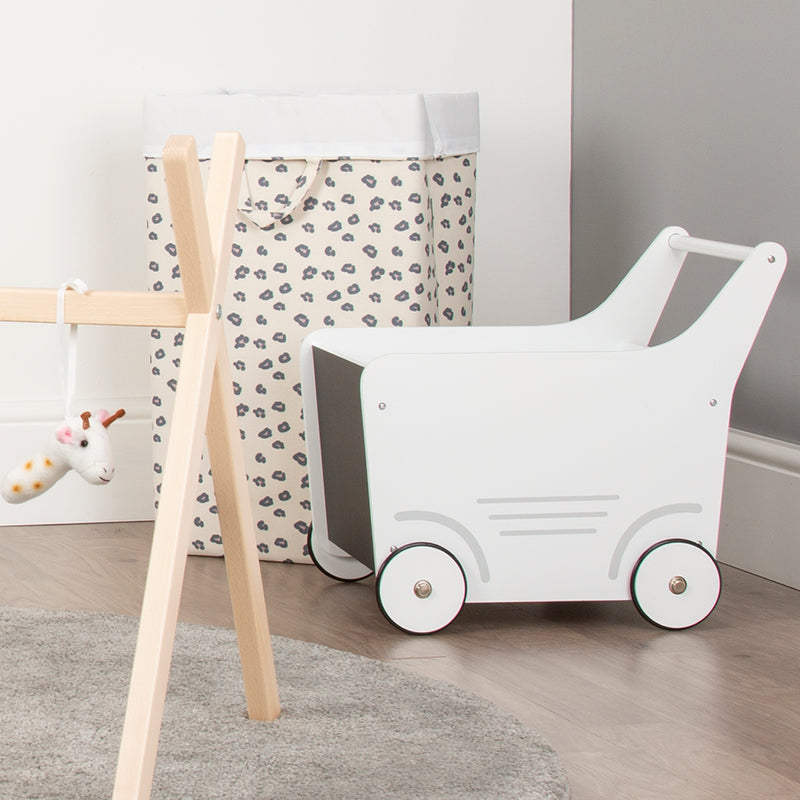 White Childhome Wooden Toy Stroller in a playroom | Toys | Baby Shower, Birthday & Christmas Gifts - Clair de Lune UK